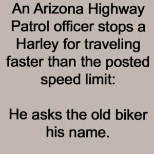 A Highway Patrol Officer Stops A Harley.