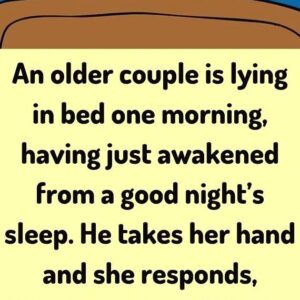 An Older Couple Is Lying In Bed.