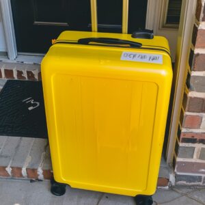 I Returned Home to Find a Big Yellow Suitcase on My Doorstep with a Note – When I Opened It, I Went Pale