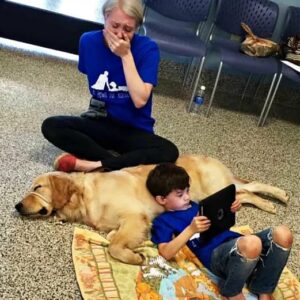 The Healing Power of Connection: A Mother’s Joy as Her Son with Autism Bonds with His Service Dog The Healing Power of Connection: A Mother’s Joy as Her Son with Autism Bonds with His Service Dog
